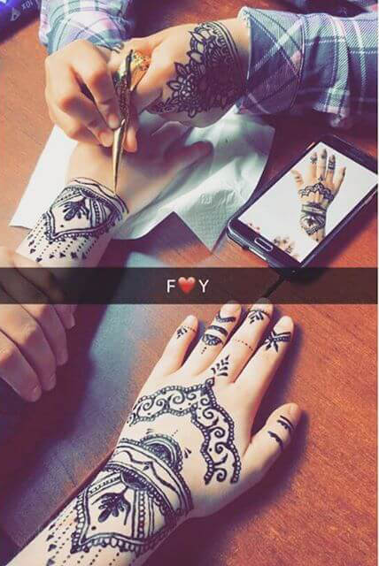 beautiful hands with elegant mehndi