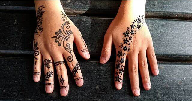 beautiful hands with elegant mehndi