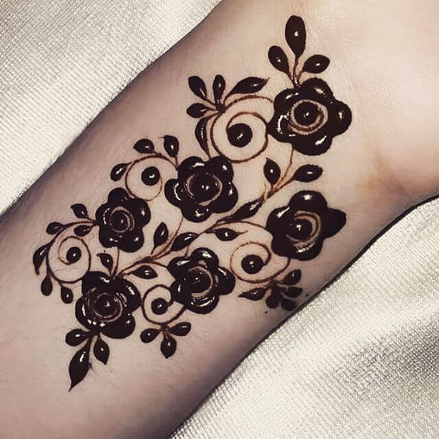 henna tatoo on arms