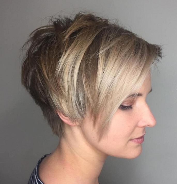 Shaggy Side-Parted Cute Bob Hairstyle for Round Faces