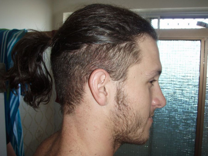 Top Ponytail with Shaved Sides Medium Length Hairstyles For Men
